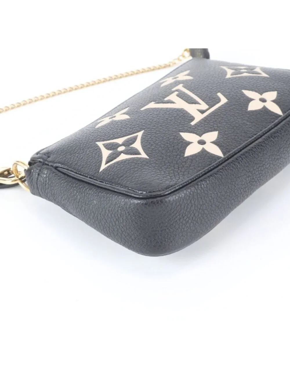Louis Vuitton Monogram Empreinte Mini Pochette Accessoires Leather Handbag